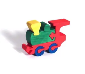 Fauna Drevené vkladacie puzzle z masívu mašinka / od 3 rokov