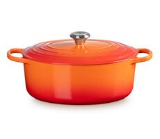 Le Creuset Signature Oválny hrniec s pokrievkou 31 cm oranžová