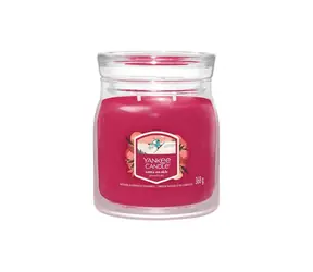 Yankee Candle SANTA ON SKIS Signature stredná