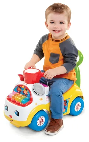 FISHER-PRICE Jazdítko Muzikálna paráda žltá / pre batoľatá / hudobné efekty